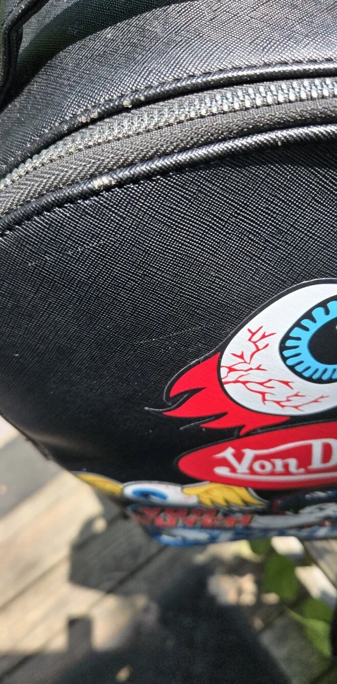 Von Dutch Black Backpack with Red & Yellow Graphic Patches